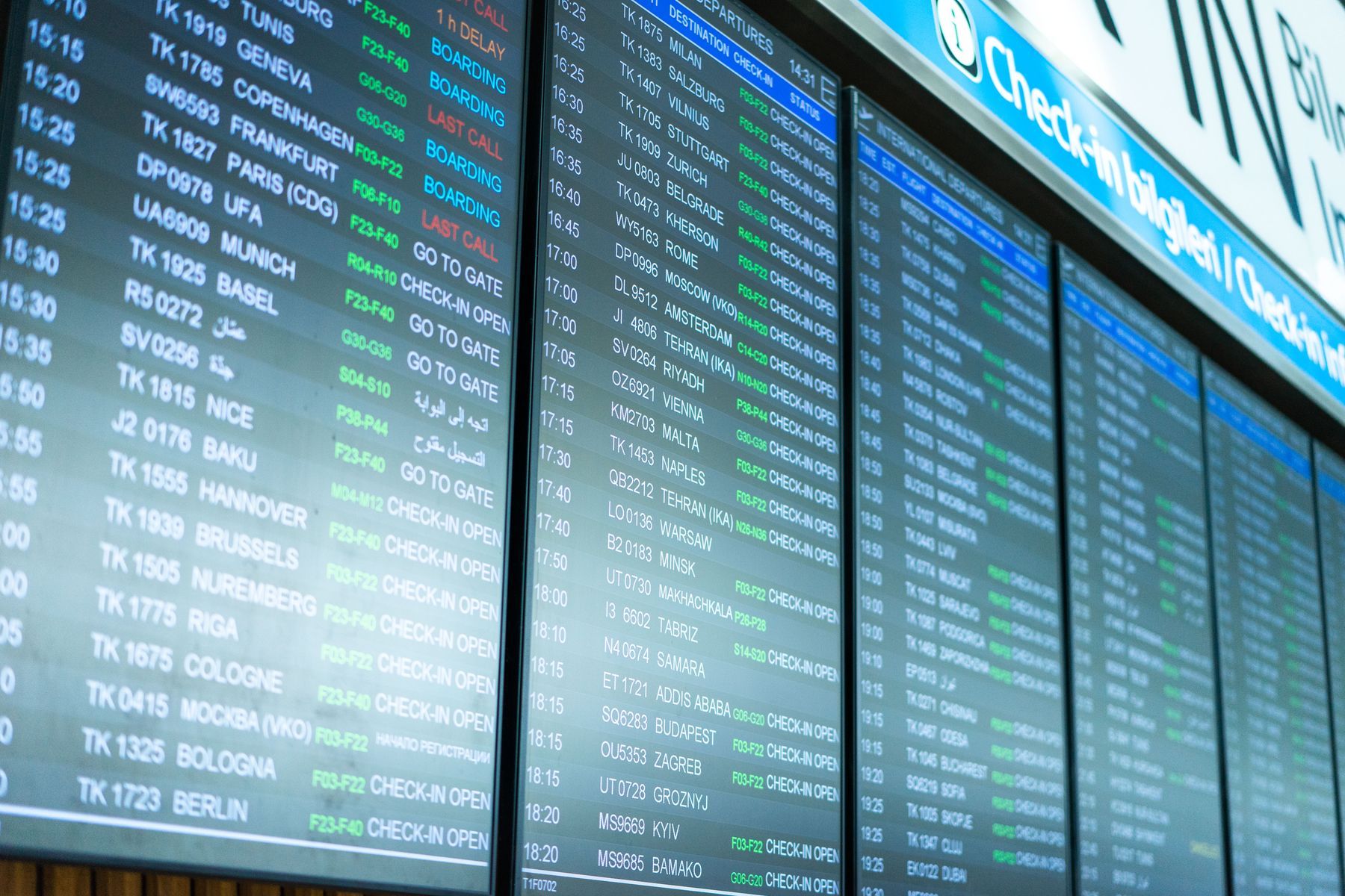 Wall of digital flight information display screens in an airport terminal