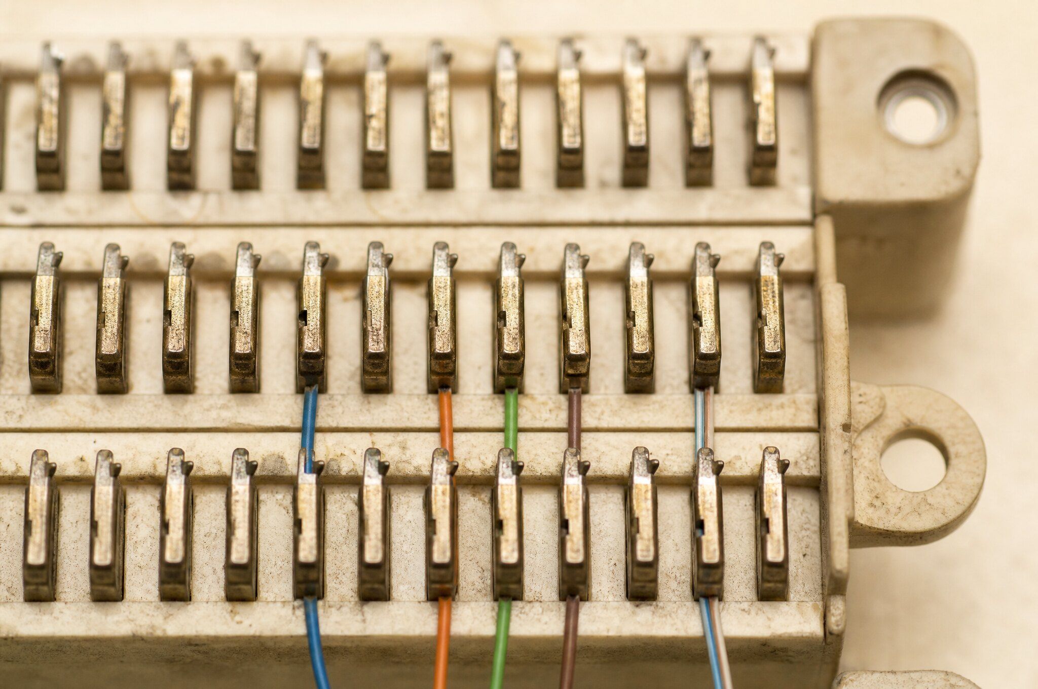 Punched down telephone block with color coded pairs terminated across it