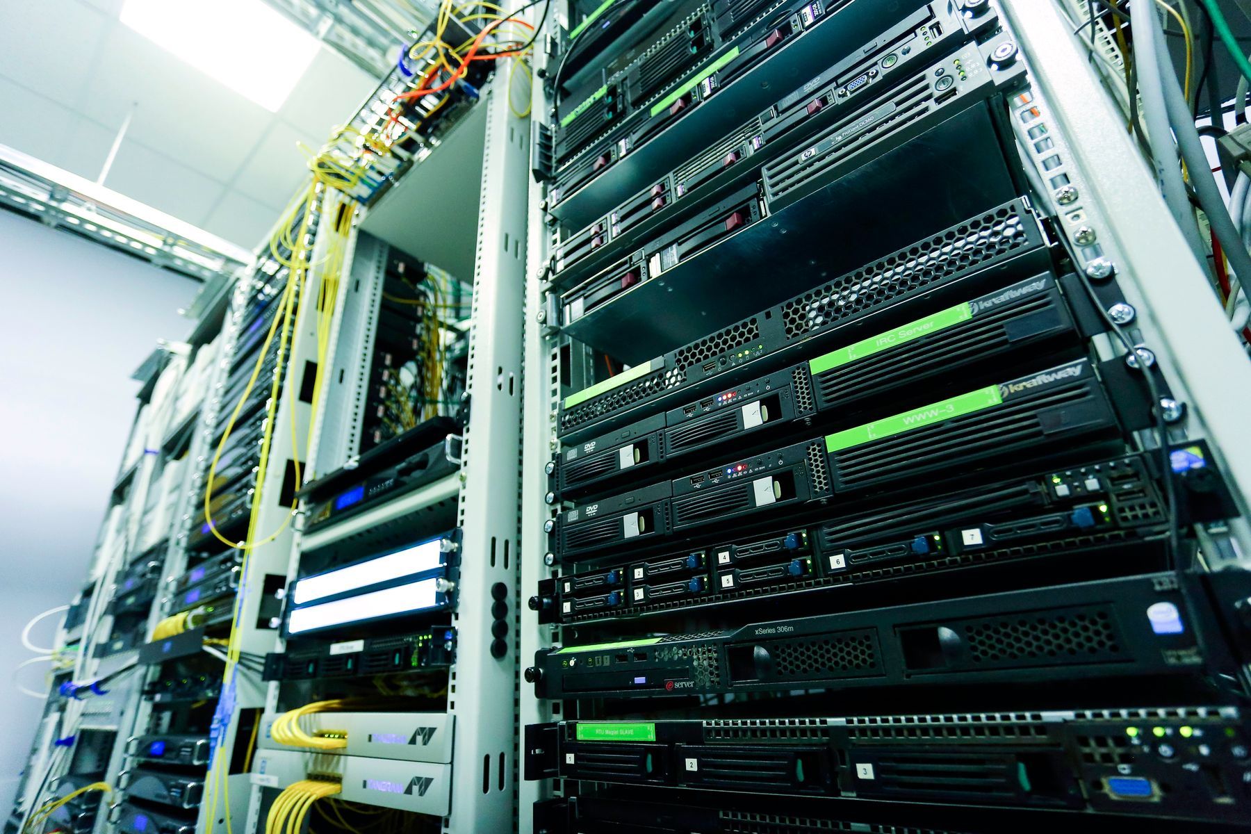 Rows of equipment racks in a network room