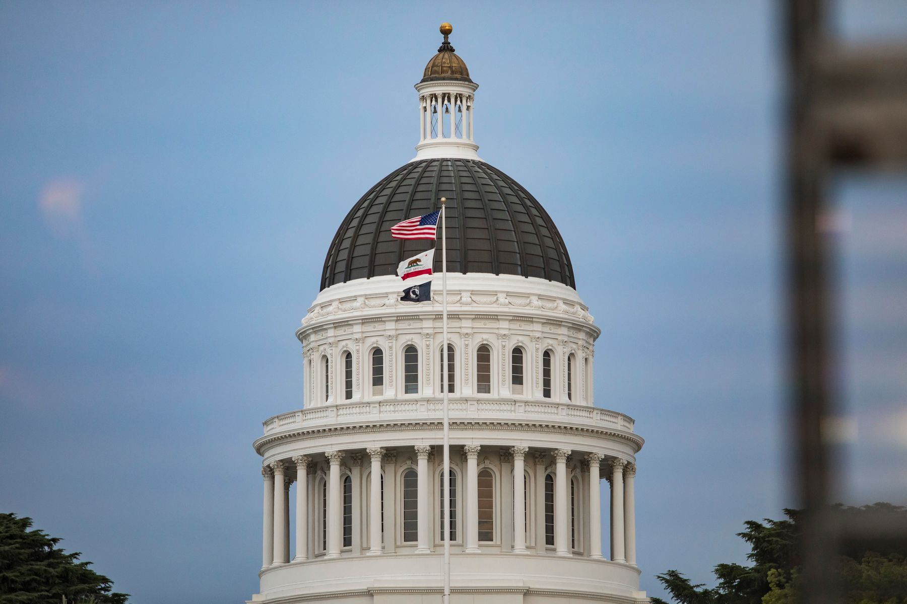 California State Capitol dome with flags