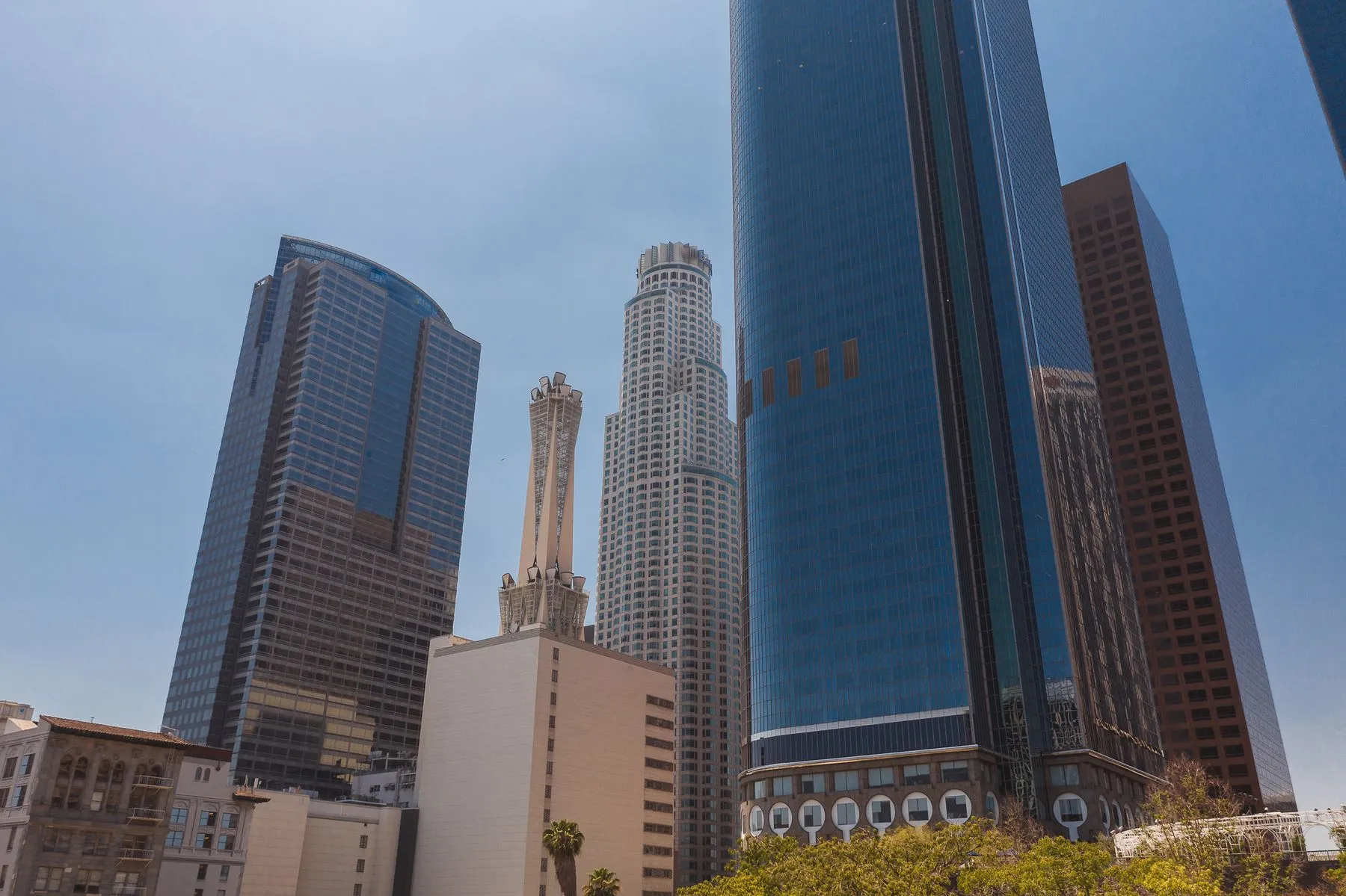 Looking up at the downtown Los Angeles high rise core against a clear sky